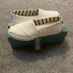 Tom’s canvas slip ons